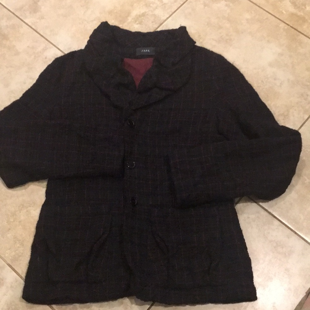 Bought  jacket in Paris. Black with red stripe.